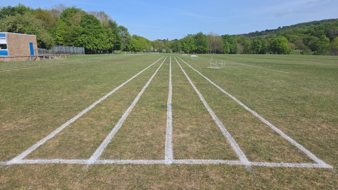 Cricket Pitch & Grass Athletics Track at Ovingham Middle School in Prudhoe