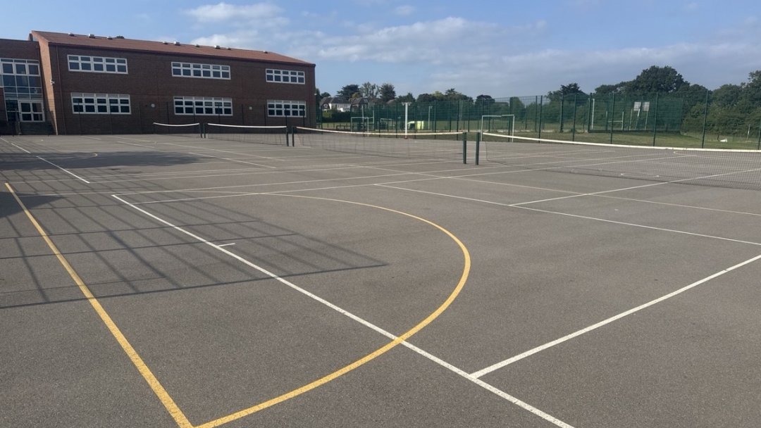 Netball & Tennis Courts (MUGA) at Esher Church Of England High School in Surrey